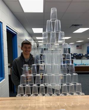 Student doing pyramid activity 